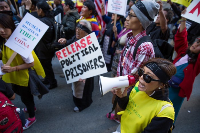 Tibet protestors march (Photo by Alex Garland)