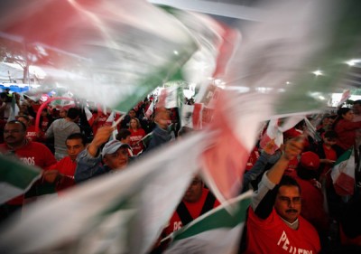 Supporters of Pena Nieto celebrate at party headquarters in Mexico City
