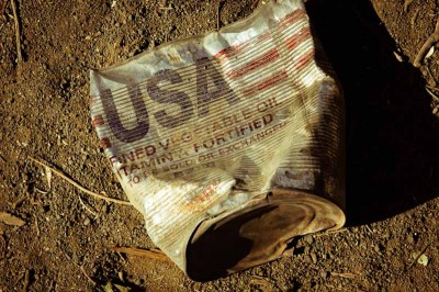 A discarded can of US food aid in Ethiopia. (Photo by Alex Stonehill)
