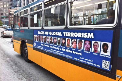 The controversial ad, show mugshots of 16 of the 31 people on the FBI Most Wanted Terrorists List. (Photo by Alex Stonehill)