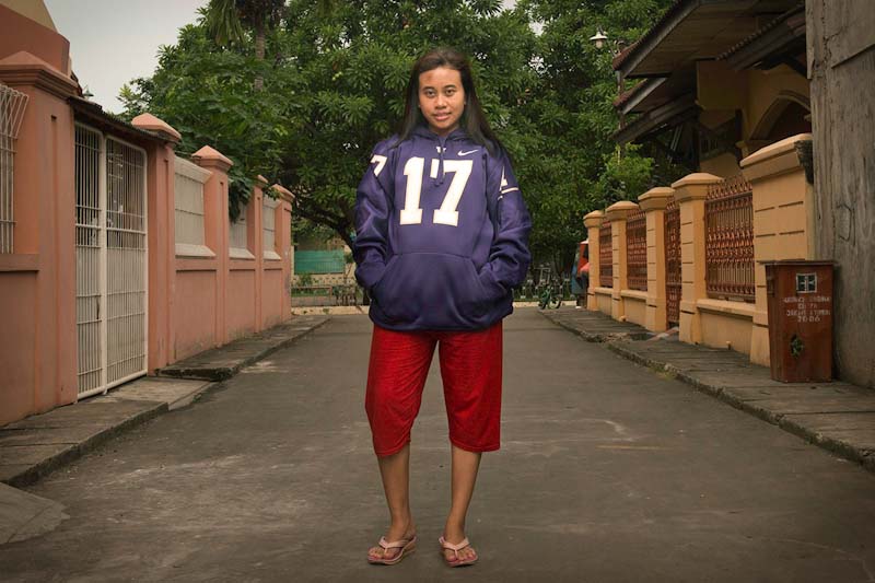 Anissa wearing the UW jersey she helped produce. (Photo by Branden Eastwood)