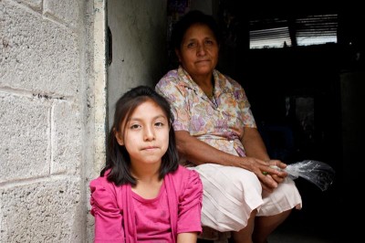 Reina Martinez Olivares (right) with her granddaughter. (Photo by Liliana Caracoza)