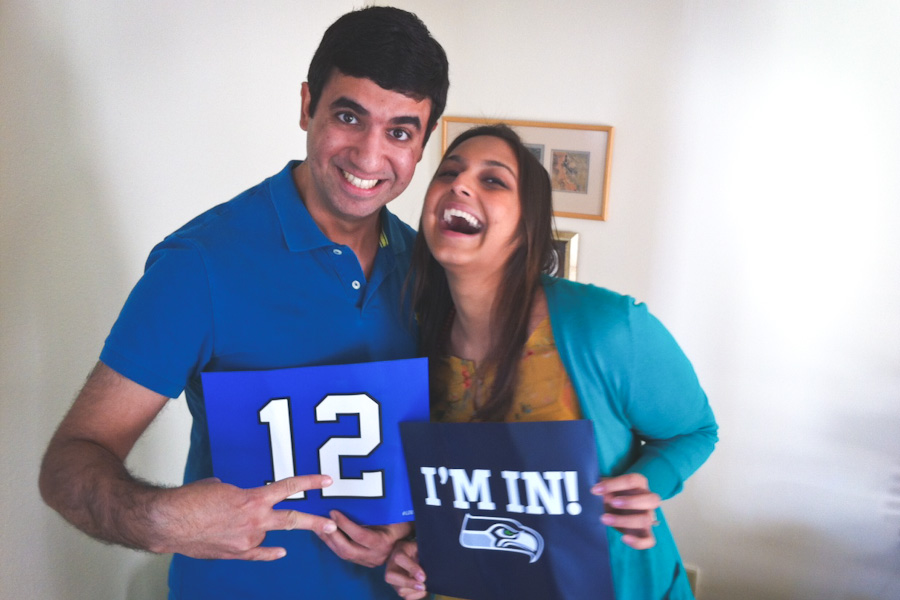 The author and her husband show off their Seahawks pride. (Photo by Alex Stonehill)