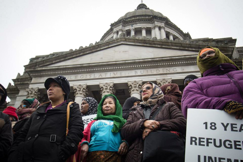 Immigrants and refugees gather on the steps of the State Capitol in February to lobby for education and other services. (Photo by Celina Kareiva)