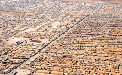 A close-up view of the Za'atri camp for Syrian refugees as seen on July 18, 2013, from a helicopter carrying U.S. Secretary of State John Kerry and Jordanian Foreign Minister Nasser Judeh. (Photo by US State Department via Wikimedia Commons)