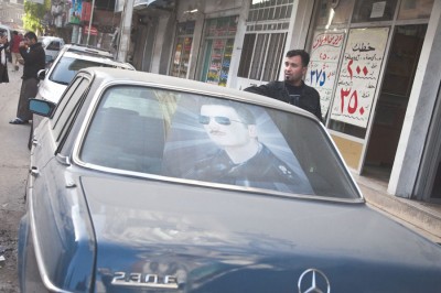 Prior to the outbreak of civil war in 2011, cars in Syria were often decorated with portraits of members of the Assad family, including Bassel, the president's deceased brother, seen here. (Photo by Alex Stonehill)