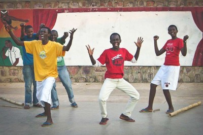 Students Mandela, Emanuel, Vladamir, Maxim and Jacky playing the Villagers in Making Peace in Old Village, August 2012. (Photo by Lea Wulferth)