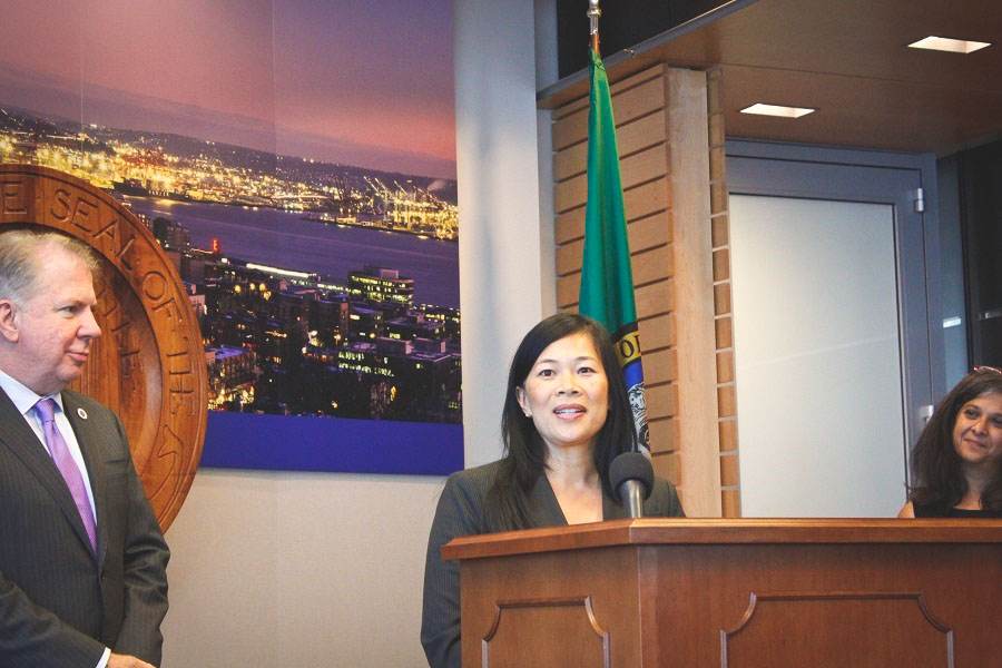 Seattle's new Office of Immigrant and Refugee Affairs Director Cuc Vu (center) flanked by Mayor Ed Murray and outgoing Interim Director Aaliyah Gupta. (Photo by Kamna Shastri)