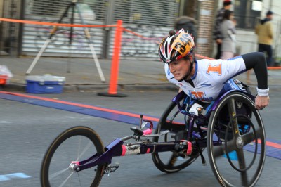 A New York City Marathon competitor uses a racing wheelchair. (Photo by Howard N2GOT via Wikipedia)