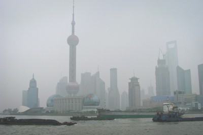 Shanghai, China shrouded in smog. Overall China emits 6.2 metric tons of CO2 per year. (Photo from Wikipedia)