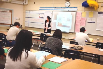Mai Tran teaching a PASA class to parents at Meridian Middle School. (Photo Courtesy Millicent Borishade)