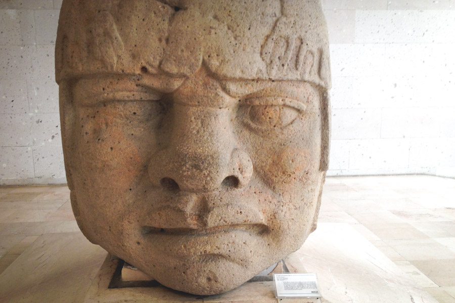 Olmec heads on display at the Anthropology Museum in Veracruz are often referenced as evidence of a pre-Columbian connection between Africa and Mexico because of their African features, but most anthropologists dismiss the connection. (Photo by Reagan Jackson)