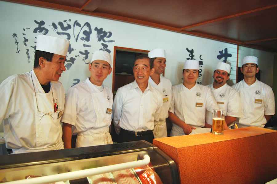 Belltown sushi restaruant "Shiro's" namesake and former chef Shiro Kashiba (third from left), with the restaurant's current chefs staff. (Photo by Ana Sofia Knauf)