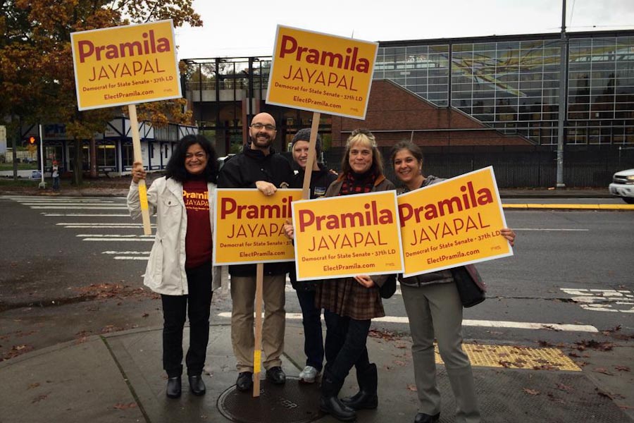 Pramila Jayapal and supportes wave signs at the corner of Martin Luther King, Jr Way and Rainier Ave on Election Day. (Photo courtesy Jayapal for State Senate)