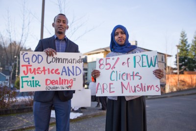 Hassan Diis (left) and Ubah Warsame at the latest in a series of demonstrations at ReWA Friday demanding a teacher be fired. More protests are planned for next week. (Photo by Alex Garland)