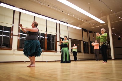 Moore and her students in a beginning level belly dancing class in Seattle. (Photo by Dominique Etzel)