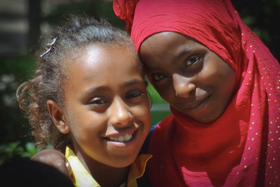 Young Muslim and Christian friends outside the National Museum in Ethiopia, where roughly a third of the population is Muslim and two thirds Christian. (Photo by Adam Jones)
