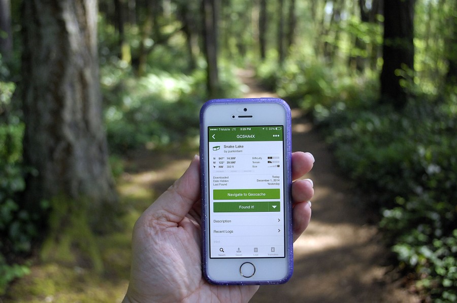 Geocaching is a world-wide treasure hunt using a GPS device or smart phone app. There are over 2.5 million geocaches around the world and with those devices, geocachers can locate a hidden container that can be slightly bigger than a thumbtack or the size of a car. (Photo by Joanna M. Kresge)
