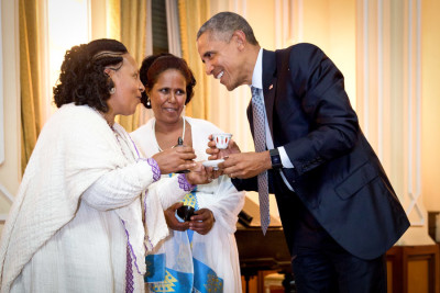 Obama tries Ethiopian coffee during a visit to National Palace in Addis Ababa. Obama delighted his hosts by saying "konjo bunna," Amharic for "delicious coffee" — customary praise after the first sip. (Photo by Pete Souza / The White House)