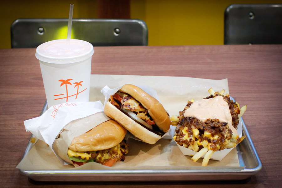 My CaliBurger test meal: Bourbon spiked milkshake, a cheeseburger, chipotle BBQ chicken sandwich, and Cali-style fries. (Photo by Jane Koh)