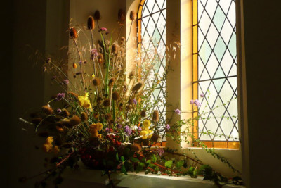 Harvest Festival flowers on display at a church in Shrewsbury, U.K. (Photo from Flickr by Marion Haworth)