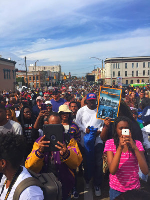 The authors joins a march in 2014 to retrace the steps of peaceful protesters who were beaten, gassed and run over by horses by Alabama authorities in 1965. (Photo by Aida Solomon)