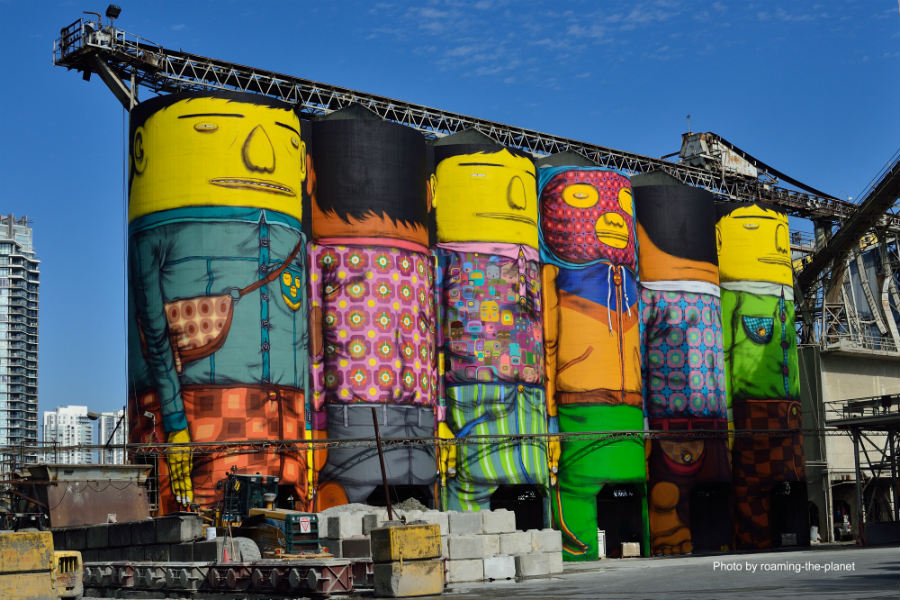 The “Giants” mural by Gustavo and Otavio Pandolfo, collectively known as OSGEMEOS. It is the biggest public art piece of their career. Photo courtesy of roaming-the-planet.