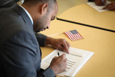 As soon as you're sworn in, you can register to vote. (Photo by Alex Stonehill)