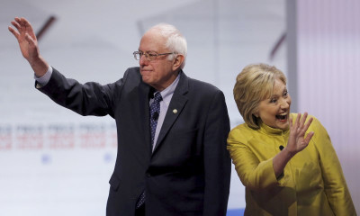 Bernie Sanders and Hillary Clinton at the Democratic presidential candidates' debate in Milwaukee, in early February. (Photo from REUTERS/Jim Young)