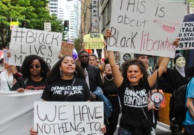 Black Lives Matter protesters side by side with anarchists during the 2015 May Day protests. (Photo from Flickr by scottlum)