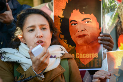 Berta Cácares' daughter speaks at a rally seeking to pressure the Organization of American States to investigate her case. (Photo by Daniel Cima / Comision Interamericano de los Derechos Humanos)