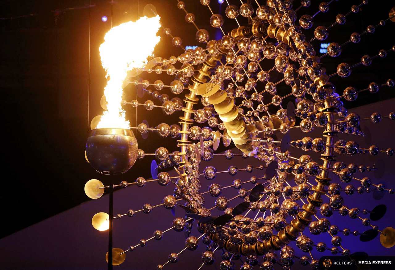 Orcas Island artist Anthony Howe's olympic cauldron is lit at the opening ceremony on Friday. (Photo from Reuters / Ivan Alvarado)