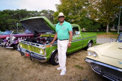 Capt. Ron stands by his classic muscle car, a 1973 Ford F100, part of the Old Riders car collection on display during the R.O.O.T.S. Picnic.
