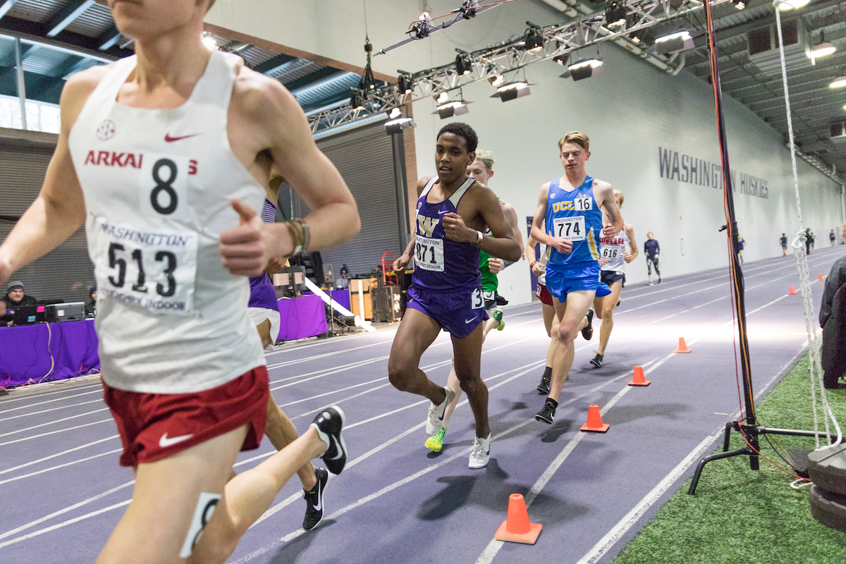Tibebu Proctor, 19, runs in the 5,000 meters at the Husky Classic for Washington on Feb. 8, 2019. Proctor earned All-American honors for the first time in his career in cross country last season after finishing 38th at the national meet.